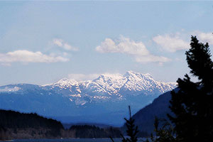 Snowy Mountain Range. Drive to Ocean Mist Guesthouse, Highway 4, Ucluelet, BC